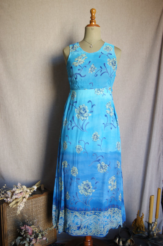 Vestit llarg floral blau dels anys 80 - S